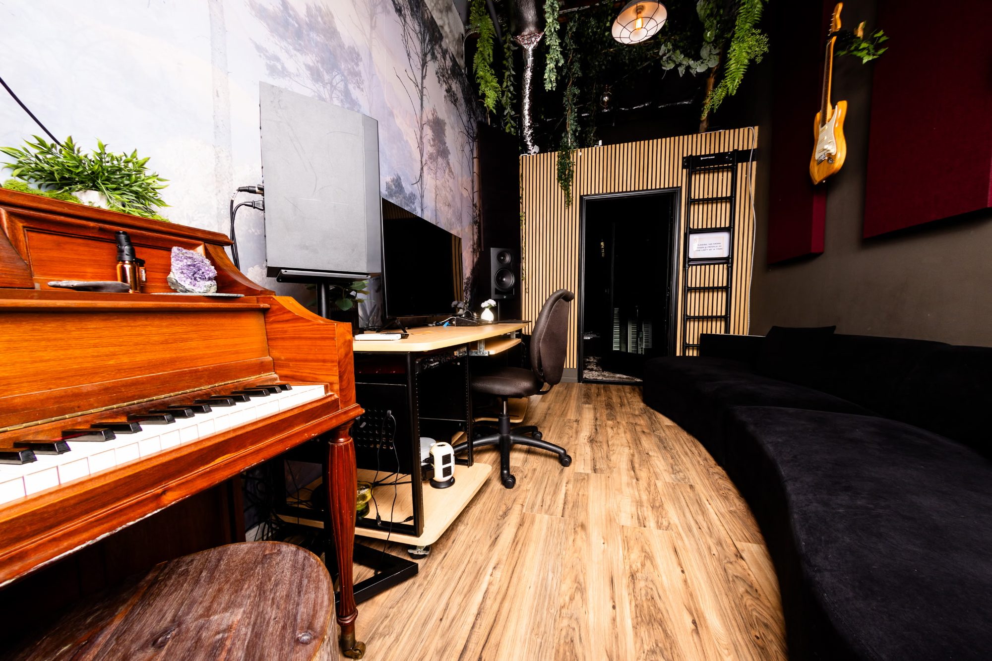 studio a — piano, desk and couch in daylight